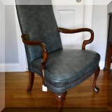 F27. Statesville blue leather desk chair with nailhead trim. 42”h x 27”w x 20”d - $185 